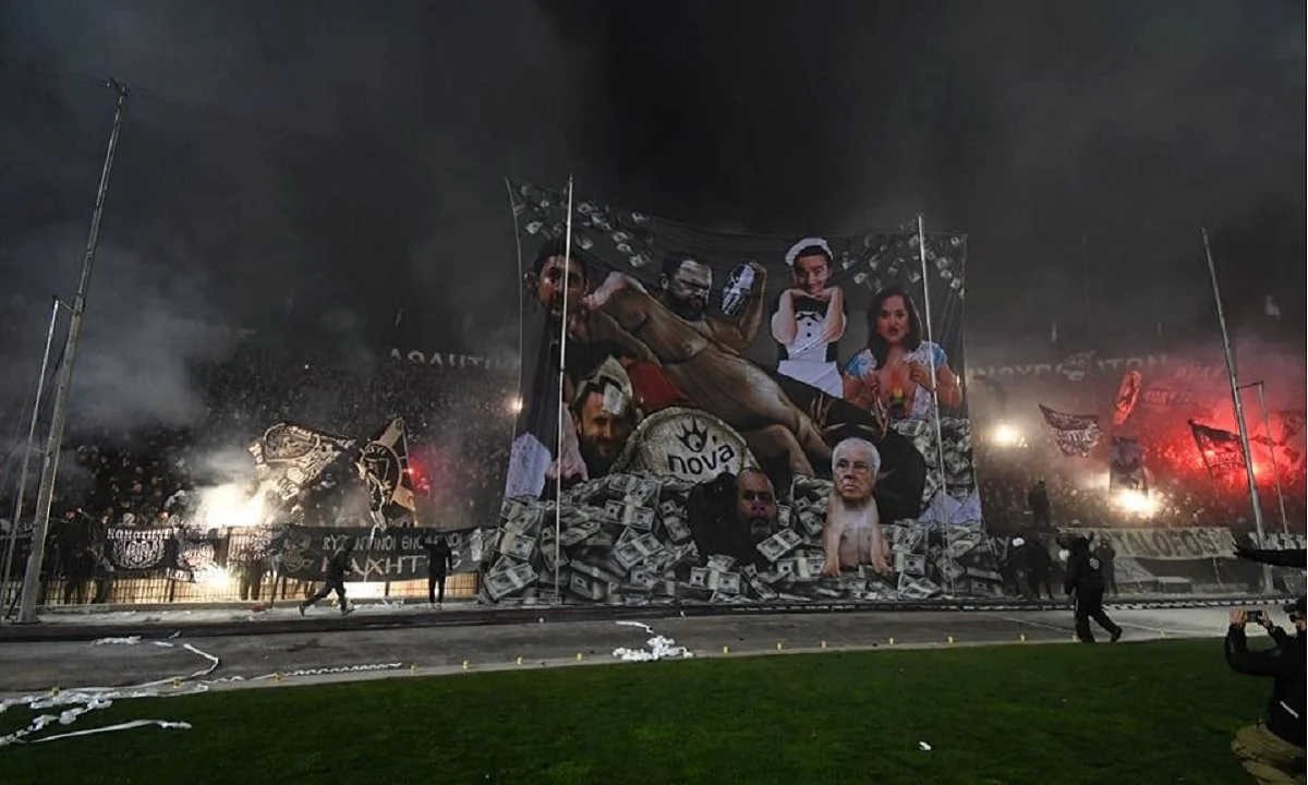 Πανό με Μαρινάκη, Καρυπίδη, ΝΔ και Noor 1 (pics)