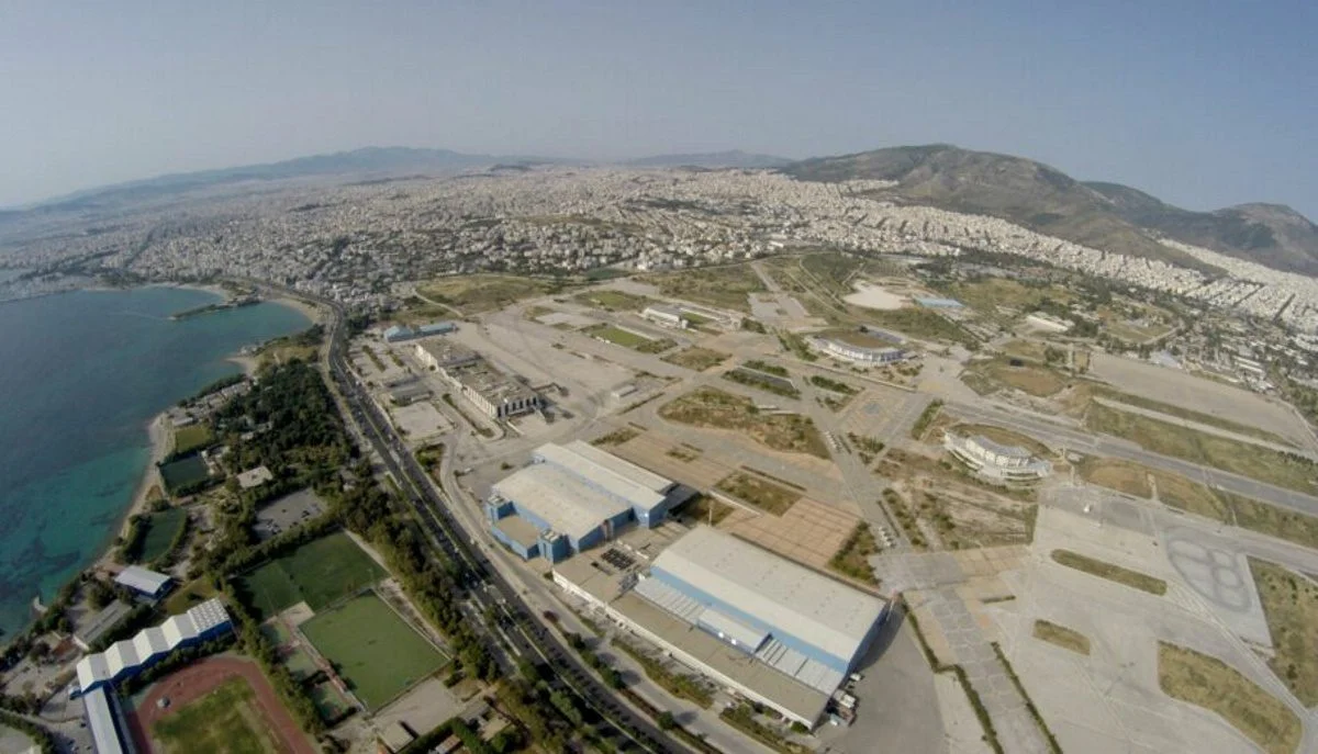 Τεράστια τα κέρδη για τη Lamda Development, αφού το κράτος χάρισε το Ελληνικό σε ποσό τουλάχιστον 2,5 φορές κάτω από την πραγματική του αξία.
